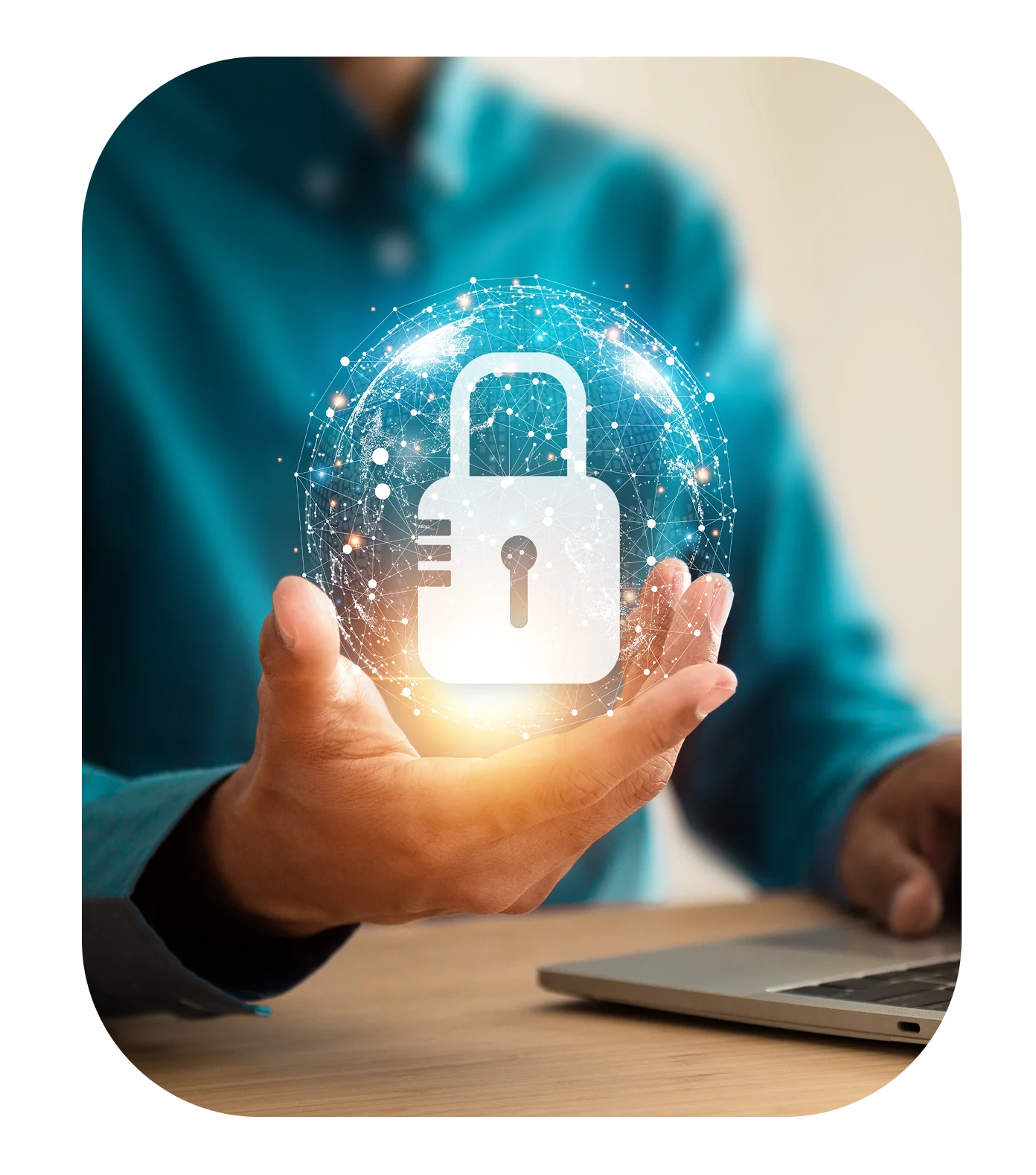 Hand holding digital lock hologram above laptop.